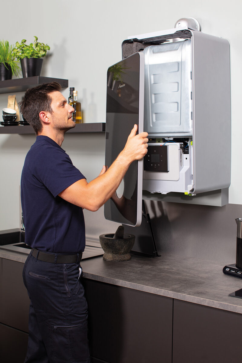 Boiler repair — inspecting internal components